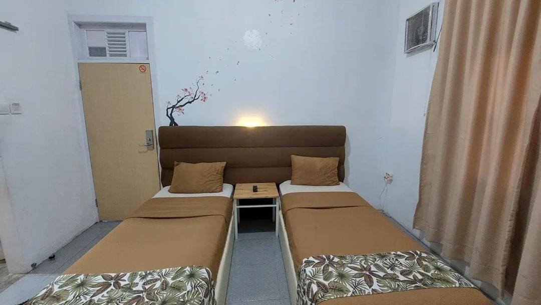 Al Barra Syariah Hotel Букиттинги Экстерьер фото